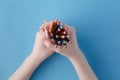 Hands full of bunch colored pencils Royalty Free Stock Photo