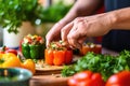 hands garnishing grill-stuffed bell peppers with parsley