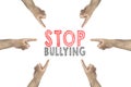 Hands gesture to the text: stop bullying