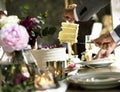 Hands getting a slice of cake