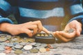 Hands girl holding calculator and coin Royalty Free Stock Photo