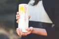 Hands of girl holding candle with crucifix for holy confirmation or communion. Royalty Free Stock Photo