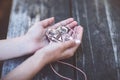 Hands of girl holding crucifix for holy confirmation or communion. Royalty Free Stock Photo