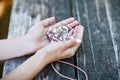 Hands of girl holding crucifix for holy confirmation or communion. Royalty Free Stock Photo