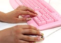 Hands of the girl on keyboard and mouse