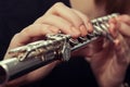 Hands girl playing a flute Royalty Free Stock Photo