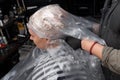 The hands girl's barber latex gloves plastic wrap client's head process dyeing hair salon