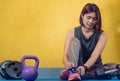 The hands of a girl`s shoelace and sneakers in the gym are ready Royalty Free Stock Photo