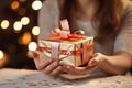 Hands of girls clasp time gifts, enclosing a meaningful present box. Memory keepers. Royalty Free Stock Photo