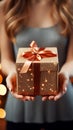 Hands of girls clasp time gifts, enclosing a meaningful present box. Memory keepers. Royalty Free Stock Photo