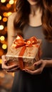 Hands of girls clasp time gifts, enclosing a meaningful present box. Memory keepers. Royalty Free Stock Photo