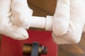 Hands in gloves glue two pieces of plastic water pipe, closeup view Royalty Free Stock Photo