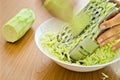Hands grating zucchini Royalty Free Stock Photo