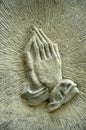Hands On A Gravestone