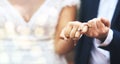 Hands, groom and bride with wedding rings in pinky promise for commitment, swear or vow on mockup. Hand of married Royalty Free Stock Photo