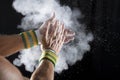 Hands of Gymnast Clapping Chalk