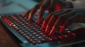 Hands of a hacker on the keyboard of a laptop in the dark Royalty Free Stock Photo