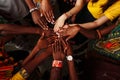 Hands of happy group of multinational African, latin american and european people which stay together in circle Royalty Free Stock Photo