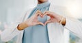 Hands, heart and business woman with love emoji for care, kindness and symbol in office. Closeup of happy female worker