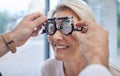 Hands, help or woman in eye exam or vision test for eyesight by doctor, optometrist or ophthalmologist. Optician helping Royalty Free Stock Photo