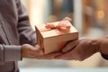 Hands hold a beautiful gift box with a ribbon and white tulips, Gift Giving, Surprise Gift - Ai Generated