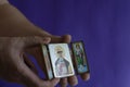 Hands hold the Christian icon of the sacred princess Olga and the archangels Gabriel and Michael Royalty Free Stock Photo