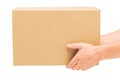 Hands hold corrugated cardboard box on isolated white background