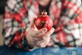 Hands hold cristmas ball Royalty Free Stock Photo