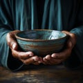 Hands hold empty bowl, portraying the harshness of hunger and economic hardship Royalty Free Stock Photo