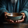 Hands hold empty bowl, portraying the harshness of hunger and economic hardship Royalty Free Stock Photo