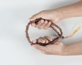 Hands hold mala Royalty Free Stock Photo