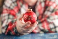 Hands hold cristmas ball Royalty Free Stock Photo