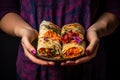 Hands hold Shawarma. Meat, vegetables and salad are wrapped in pita bread. Side view Royalty Free Stock Photo