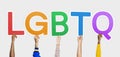 Hands holding the abbreviation LGBTQ Royalty Free Stock Photo