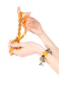 Hands holding amber necklace and bracelet Royalty Free Stock Photo