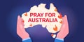 Hands holding Australia map forest fires wildfire bushfire natural disaster pray for Australia concept horizontal Royalty Free Stock Photo