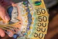 Hands holding australian dollars 50 banknotes. Royalty Free Stock Photo