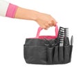 Hands holding a bag of hairdressing appliances Royalty Free Stock Photo