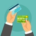 Hands holding bank cards in flat design style
