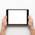 Hands holding a blank tablet screen Royalty Free Stock Photo