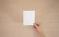 Hands holding blank white brochure booklet in the hand. Leaflet Royalty Free Stock Photo