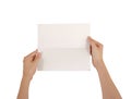 Hands holding blank white brochure booklet in the hand. Leaflet Royalty Free Stock Photo