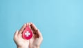 hands holding blood drop paper cut, blood transfusion, world blood donor day, red cross to give blood.world hemophilia day concept Royalty Free Stock Photo