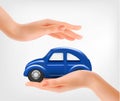 Hands, holding a blue model car.