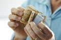 Hands holding Brazilian real notes - Money from Brazil - Notes of Real - Brazil BRL banknote Royalty Free Stock Photo