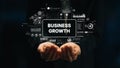 Hands Holding Business Growth Concept with Data Analysis and Graphs for Modern Entrepreneurship and Strategy Royalty Free Stock Photo