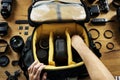 Hands holding a camera bag preparing put an equipment in Royalty Free Stock Photo