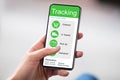 Customer Using Phone With Shipment Tracking Website Royalty Free Stock Photo