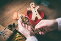 Hands holding cgilden christmas key Royalty Free Stock Photo