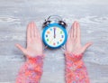 Hands holding clock Royalty Free Stock Photo